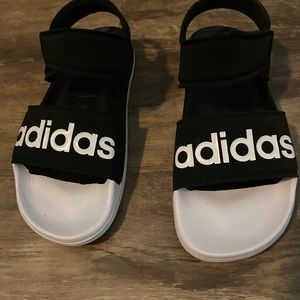 Black and white adidas sandals
